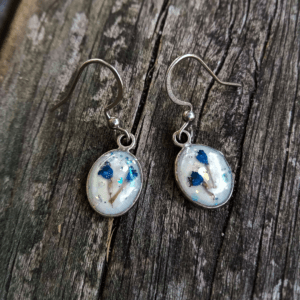 Lavender earrings encased in resin